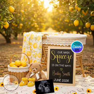 Picnic setup with teddy bear, baby booties, and 'Our Main Squeeze is on the Way!' sign in an orchard.