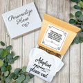 Personalized adoption-themed gift set with text on a wooden surface.