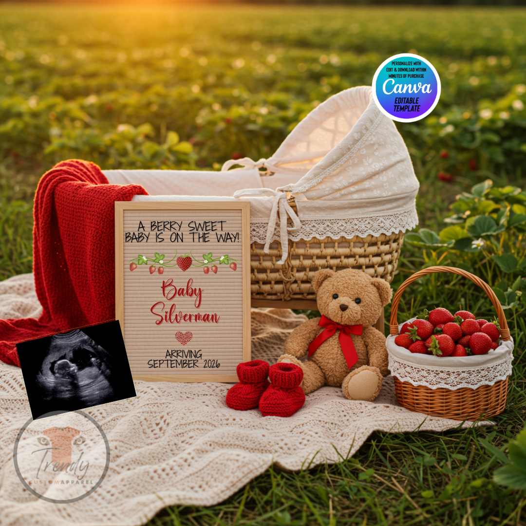 Baby shower setup with a basket, teddy bear, and baby shoes on a grassy field.