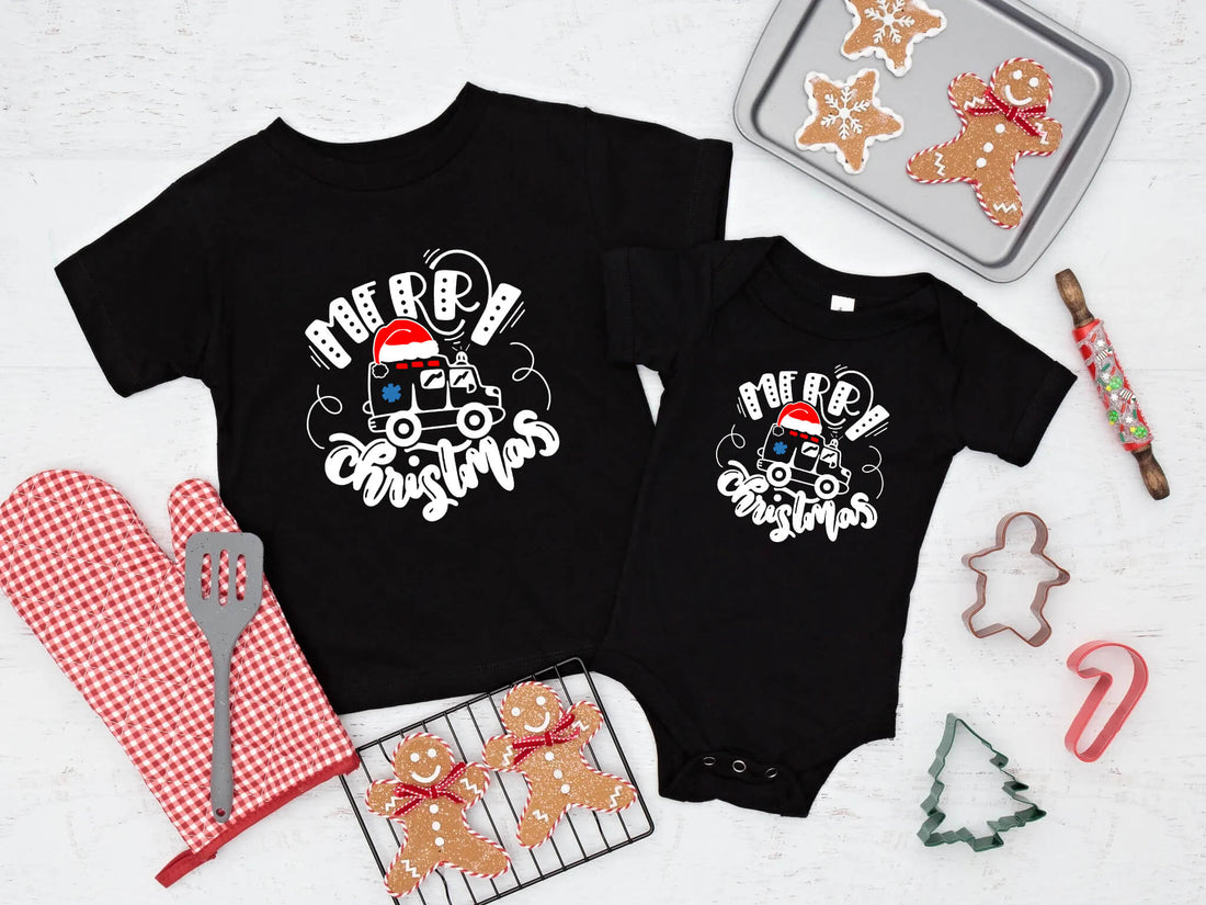 Navidad Feliz Navidad Ambulancia Camiseta con estampado gráfico para niño / niña