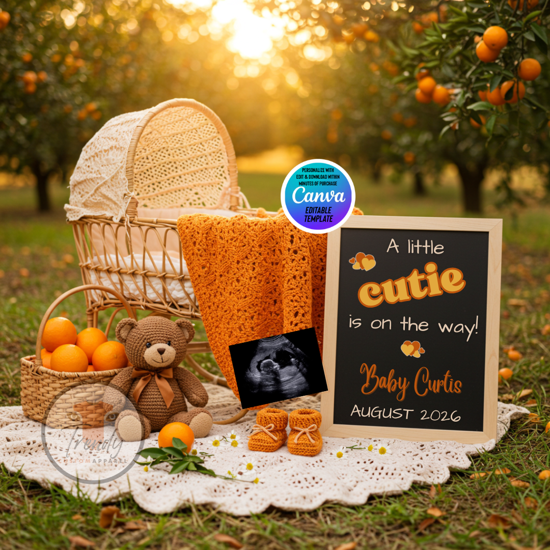 Baby shower setup with basket, teddy bear, and 'A little cutie is on the way!' sign in an orange orchard.