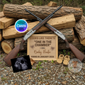 Two crossed shotguns on logs with a wooden plaque for baby announcement and baby shoes, editable in Canva.